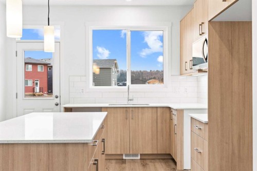 918 Creekside Boulevard Sw, Calgary, AB - Indoor Photo Showing Kitchen