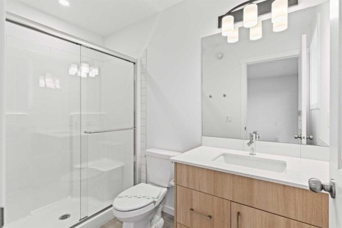 918 Creekside Boulevard Sw, Calgary, AB - Indoor Photo Showing Bathroom