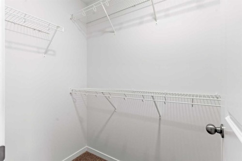 918 Creekside Boulevard Sw, Calgary, AB - Indoor With Storage