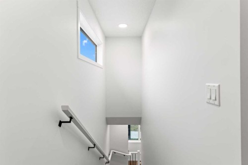 918 Creekside Boulevard Sw, Calgary, AB - Indoor Photo Showing Other Room