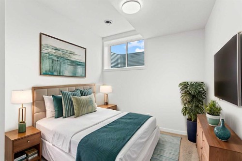 918 Creekside Boulevard Sw, Calgary, AB - Indoor Photo Showing Bedroom