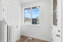 918 Creekside Boulevard Sw, Calgary, AB  - Indoor Photo Showing Other Room 