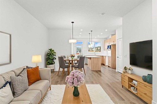 918 Creekside Boulevard Sw, Calgary, AB - Indoor Photo Showing Living Room