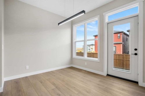 62 Amblefield Common Nw, Calgary, AB - Indoor Photo Showing Other Room