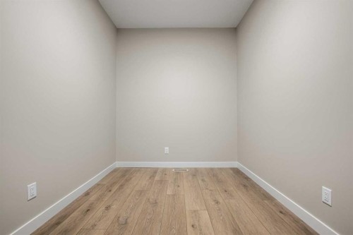 62 Amblefield Common Nw, Calgary, AB - Indoor Photo Showing Other Room