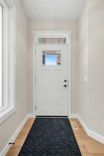 62 Amblefield Common Nw, Calgary, AB - Indoor Photo Showing Other Room