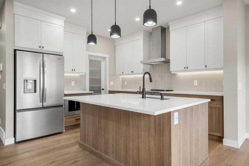 62 Amblefield Common Nw, Calgary, AB - Indoor Photo Showing Kitchen With Upgraded Kitchen