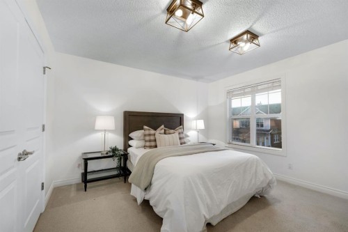 12-10 St Julien Drive Sw, Calgary, AB - Indoor Photo Showing Bedroom