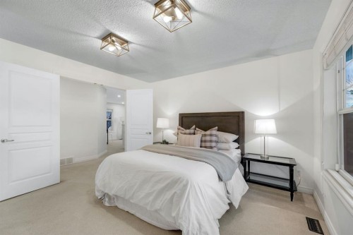 12-10 St Julien Drive Sw, Calgary, AB - Indoor Photo Showing Bedroom