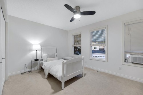 12-10 St Julien Drive Sw, Calgary, AB - Indoor Photo Showing Bedroom