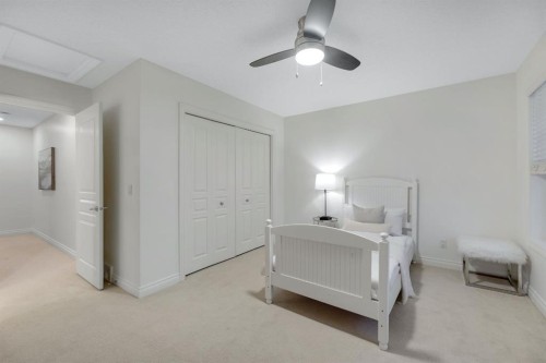 12-10 St Julien Drive Sw, Calgary, AB - Indoor Photo Showing Bedroom