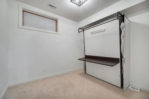 12-10 St Julien Drive Sw, Calgary, AB - Indoor Photo Showing Other Room