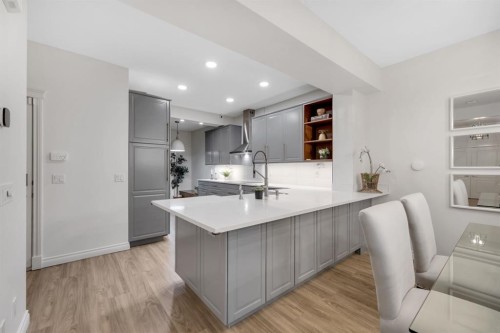 12-10 St Julien Drive Sw, Calgary, AB - Indoor Photo Showing Kitchen With Upgraded Kitchen