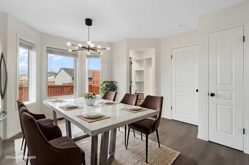 211 Elgin Meadows Gardens Se, Calgary, AB - Indoor Photo Showing Dining Room