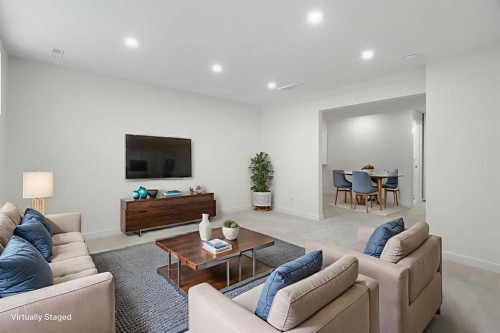 211 Elgin Meadows Gardens Se, Calgary, AB - Indoor Photo Showing Living Room
