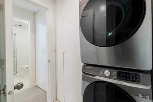 211 Elgin Meadows Gardens Se, Calgary, AB - Indoor Photo Showing Laundry Room