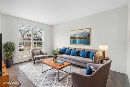 211 Elgin Meadows Gardens Se, Calgary, AB - Indoor Photo Showing Living Room