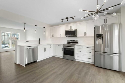 211 Elgin Meadows Gardens Se, Calgary, AB - Indoor Photo Showing Kitchen With Upgraded Kitchen