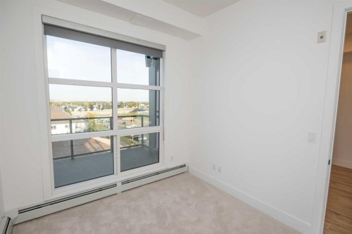 414-330 Dieppe Drive Sw, Calgary, AB - Indoor Photo Showing Other Room