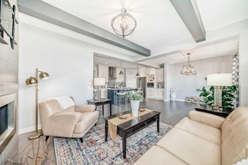 98 Legacy Lane Se, Calgary, AB - Indoor Photo Showing Living Room With Fireplace