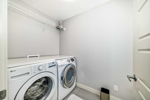 98 Legacy Lane Se, Calgary, AB - Indoor Photo Showing Laundry Room