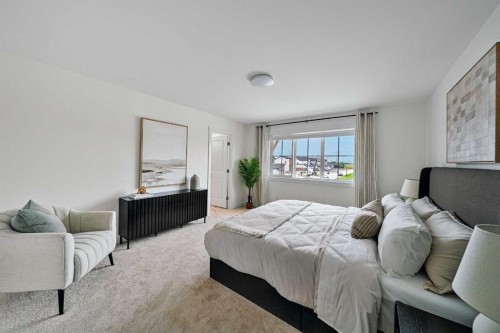 412 Ranch Gate, Strathmore, AB - Indoor Photo Showing Bedroom