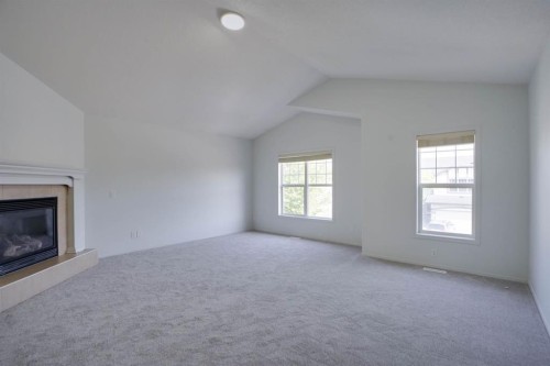 382 Brightonstone Green Se, Calgary, AB - Indoor With Fireplace