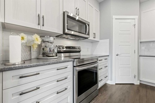3 Sage Bluff Heights Nw, Calgary, AB - Indoor Photo Showing Kitchen With Upgraded Kitchen