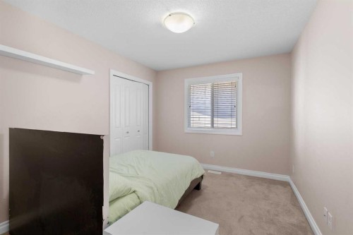 529 Saddlelake Drive Ne, Calgary, AB - Indoor Photo Showing Bedroom