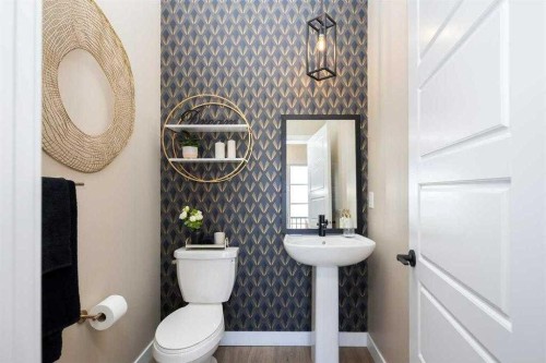 157 Wild Rose Way Se, Calgary, AB - Indoor Photo Showing Bathroom