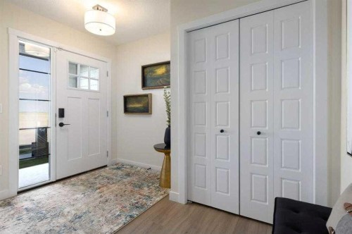157 Wild Rose Way Se, Calgary, AB - Indoor Photo Showing Other Room