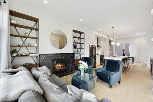 4929 20 Street Sw, Calgary, AB - Indoor Photo Showing Living Room With Fireplace