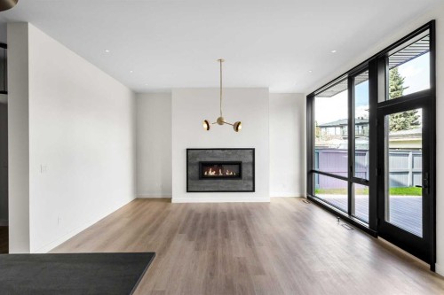 3C Willow Crescent Sw, Calgary, AB - Indoor Photo Showing Living Room With Fireplace