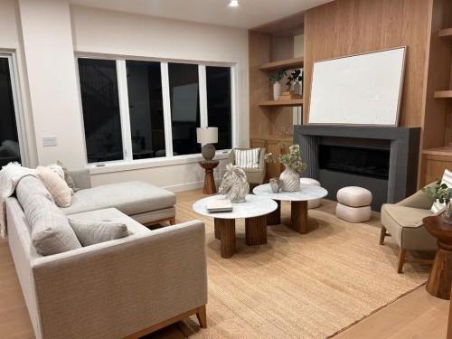 6312 Lacombe Way Sw, Calgary, AB - Indoor Photo Showing Living Room With Fireplace