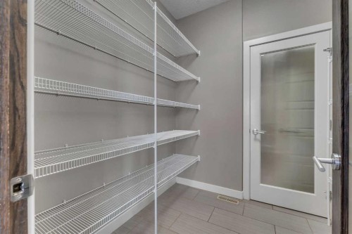 204 Sunset View, Cochrane, AB - Indoor With Storage