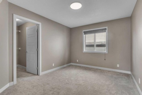 204 Sunset View, Cochrane, AB - Indoor Photo Showing Other Room