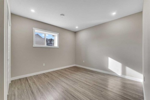 204 Sunset View, Cochrane, AB - Indoor Photo Showing Other Room