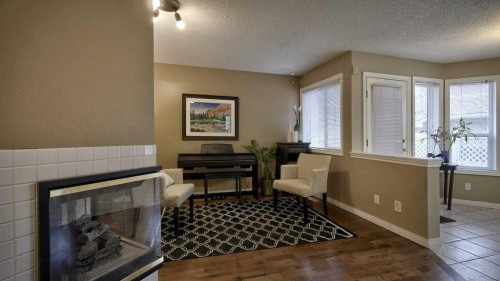 138 Sierra Morena Green Sw, Calgary, AB - Indoor With Fireplace