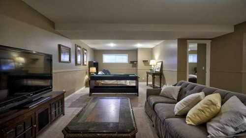 138 Sierra Morena Green Sw, Calgary, AB - Indoor Photo Showing Living Room With Fireplace