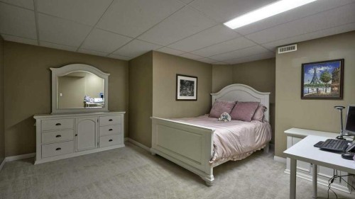 138 Sierra Morena Green Sw, Calgary, AB - Indoor Photo Showing Bedroom