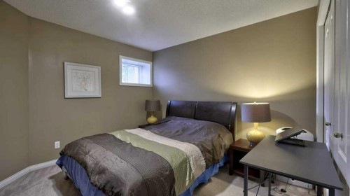 138 Sierra Morena Green Sw, Calgary, AB - Indoor Photo Showing Bedroom