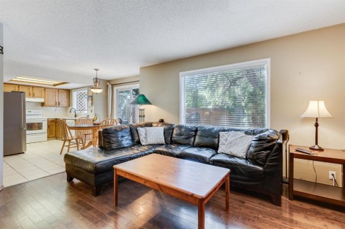 212 Mckerrell Way Se, Calgary, AB - Indoor Photo Showing Living Room