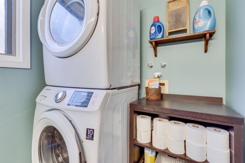 212 Mckerrell Way Se, Calgary, AB - Indoor Photo Showing Laundry Room