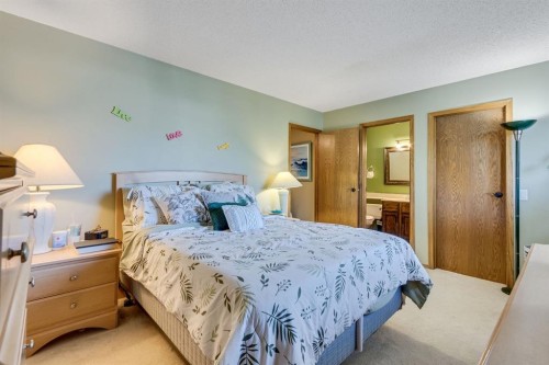 212 Mckerrell Way Se, Calgary, AB - Indoor Photo Showing Bedroom