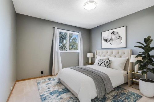 212 Mckerrell Way Se, Calgary, AB - Indoor Photo Showing Bedroom
