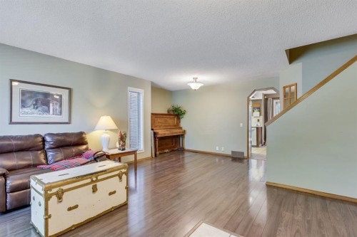 212 Mckerrell Way Se, Calgary, AB - Indoor Photo Showing Living Room