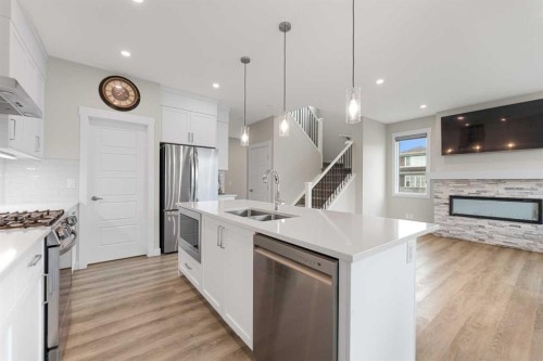 7 Corner Glen Common Ne, Calgary, AB - Indoor Photo Showing Kitchen With Stainless Steel Kitchen With Double Sink With Upgraded Kitchen