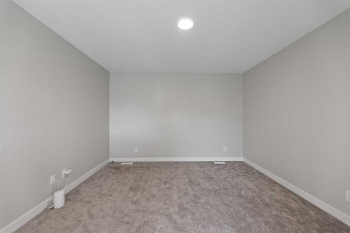 7 Corner Glen Common Ne, Calgary, AB - Indoor Photo Showing Other Room
