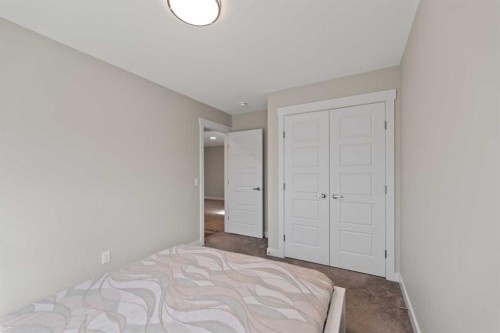 7 Corner Glen Common Ne, Calgary, AB - Indoor Photo Showing Bedroom