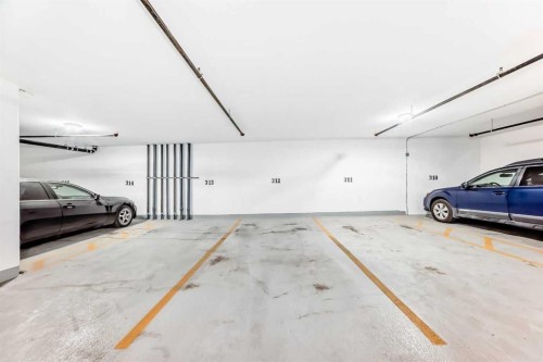 1013-730 2 Avenue Sw, Calgary, AB - Indoor Photo Showing Garage
